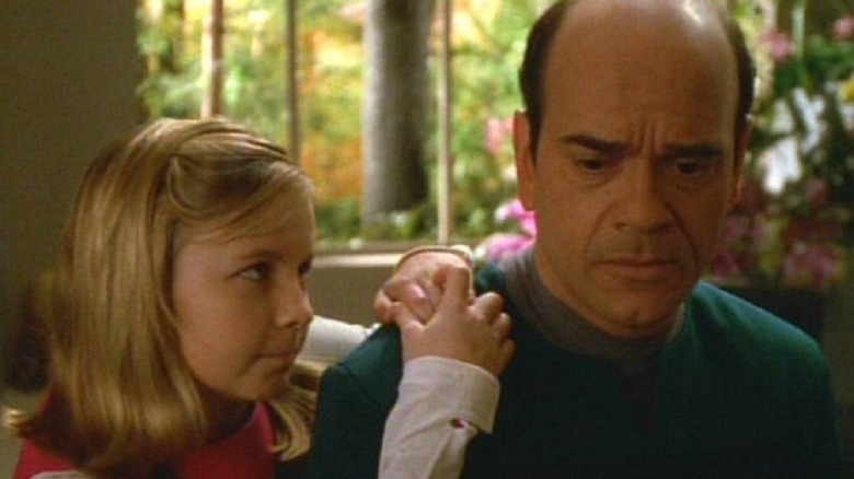 Belle (Lindsey Haun) comforts the Doctor (Robert Picardo) in Star Trek: Voyager