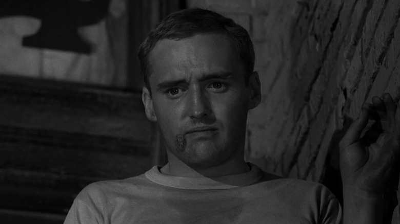 Peter Vollmer (Dennis Hopper) stares at a victim in The Twilight Zone episode He's Alive