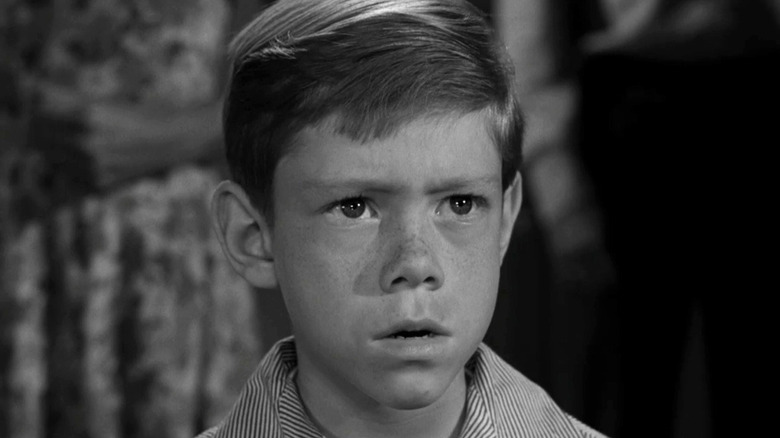 Anthony Fremont (Bill Mumy) is disturbed in The Twilight Zone episode It's a Good Life