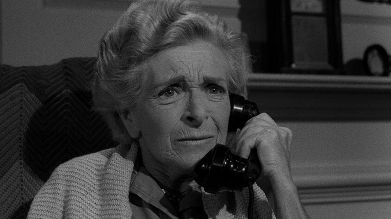 Elva Keene (Gladys Cooper) takes a phone call in The Twilight Zone episode Night Call