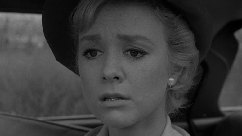 Nan Adams (Inger Stevens) is terrified in The Twilight Zone episode The Hitch-Hiker
