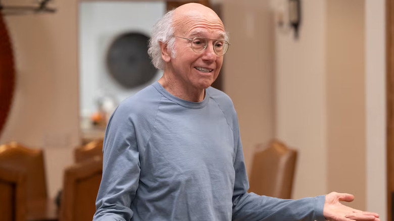 Larry David shrugging in Curb Your Enthusiasm