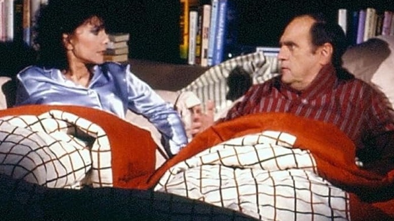 Dr. Robert Hartley (Bob Newhart) wakes up Emily (Suzanne Pleshette) on Newhart