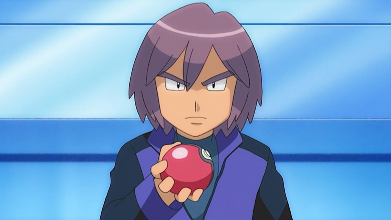 Paul holding a Poke Ball in his hands
