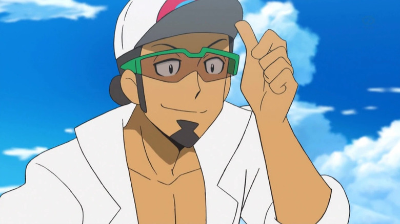 Professor Kukui pressing up his hat and smiling
