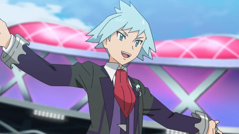 Steven with his arms outstretched in a Pokemon stadium