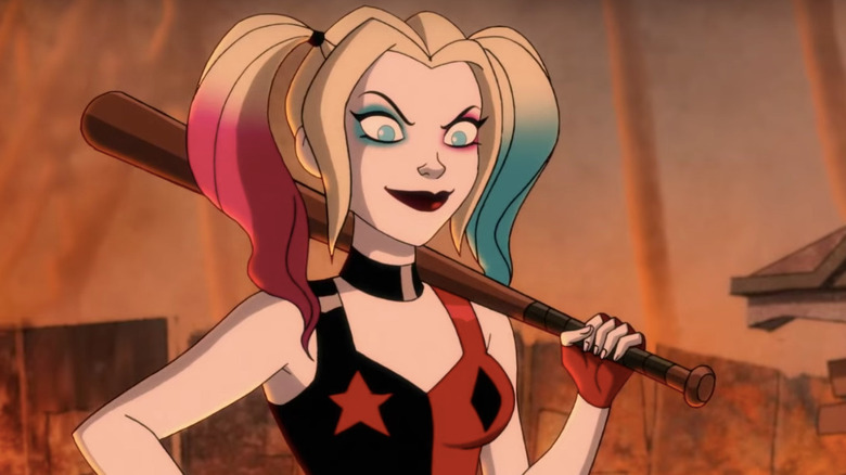 Harley Quinn smiling and holding a baseball bat in Harley Quinn