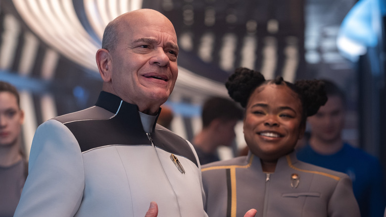 Robert Picardo as The Doctor pontificates to fellow living hologram SAM, played by Kerrice Brooks, on Starfleet Academy.