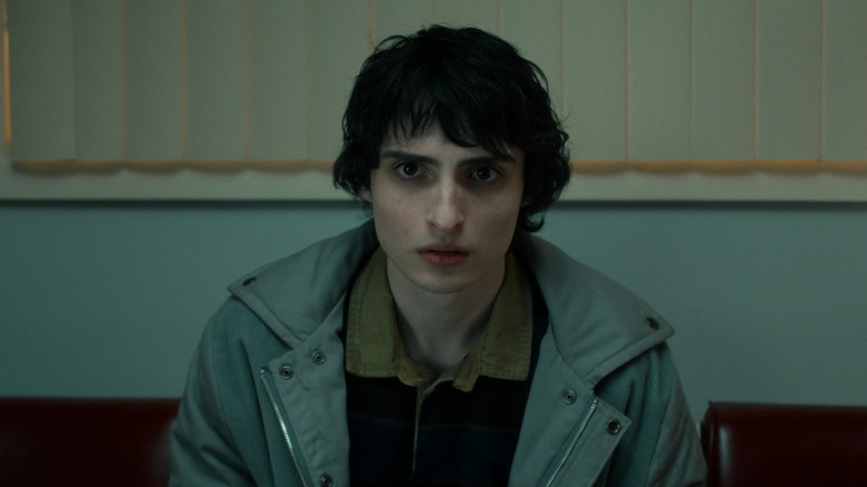 Mike Wheeler (Finn Wolfhard) looking concerned in Stranger Things