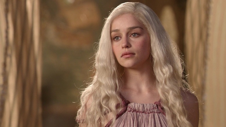 Emilia Clarke's Daenerys Targaryen staring into the distance in Game of Thrones