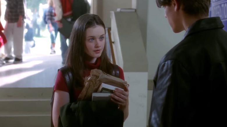 Alexis Bledel's Rory Gilmore speaking to Jared Padalecki's Dean Forester in Gilmore Girls