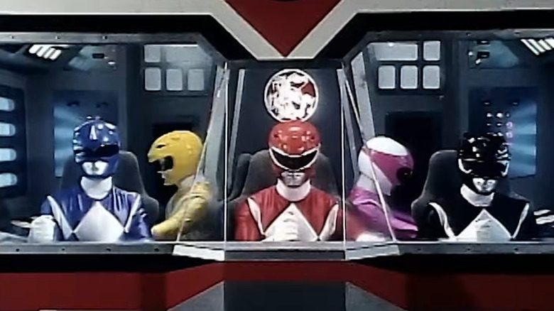 The Power Rangers operating Megazord in Power Rangers