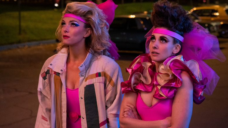 Ruth (Alison Brie) and Debbie (Betty Gilpin) looking up on GLOW