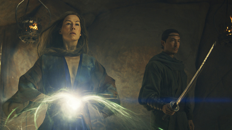 Moiraine (Rosamund Pike) casting a spell on The Wheel of Time