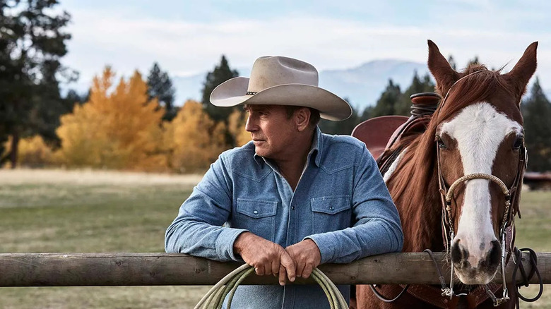 John Dutton (Kevin Costner) with horse in Yellowstone