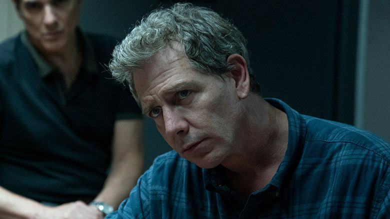 Ben Mendelsohn as Ralph looking concerned in The Outsider