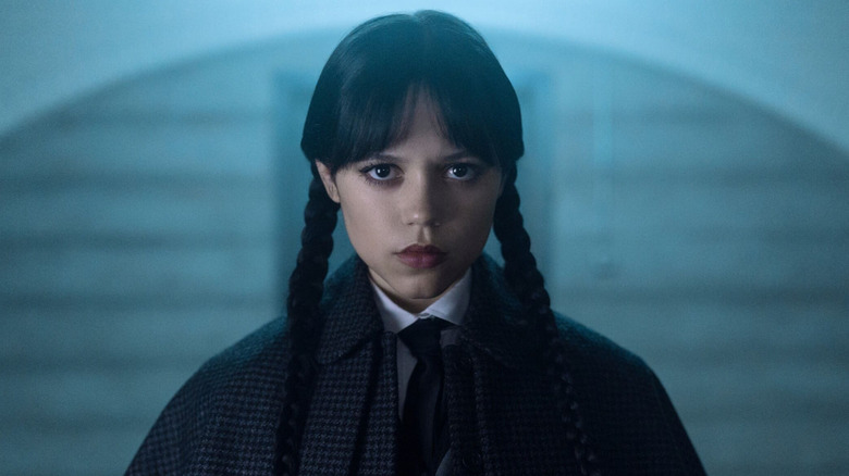 Jenna Ortega as Wednesday Addams looking straight ahead in Wednesday