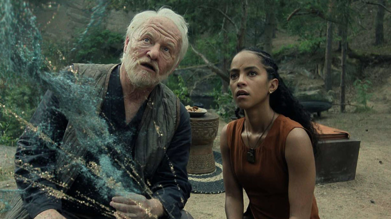 Jared Harris as Hariton "Hari" Seldon and Lou Llobell as Gaal Dornick experimenting in Foundation
