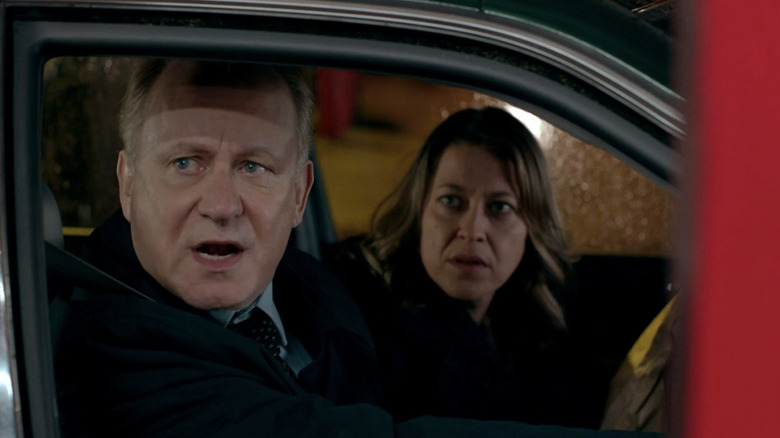 Stellan Skarsgård as John River sitting in car next to Nicola Walker as Stevie in River
