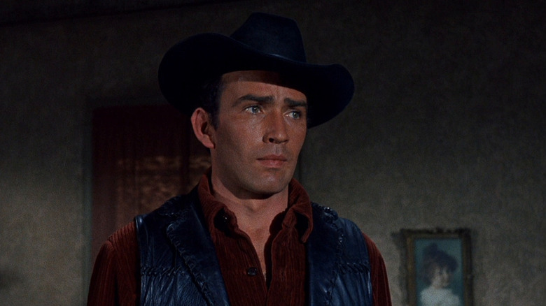 James Drury as the Virginian looking concerned on The Virginian