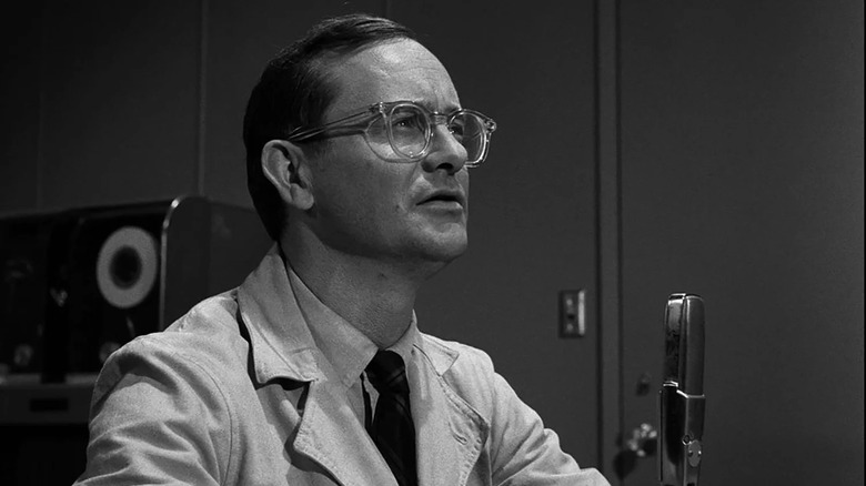 James Elwood (Wally Cox) looks up at a computer screen in The Twilight Zone (1959)