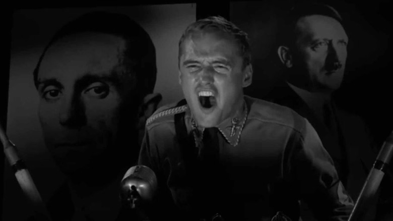 Peter Vollmer (Dennis Hopper) shouts before images of Adolf Hitler in The Twilight Zone (1959)