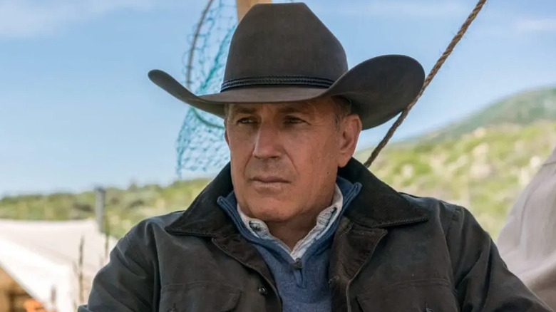 John Dutton (Kevin Costner) sitting down on "Yellowstone."