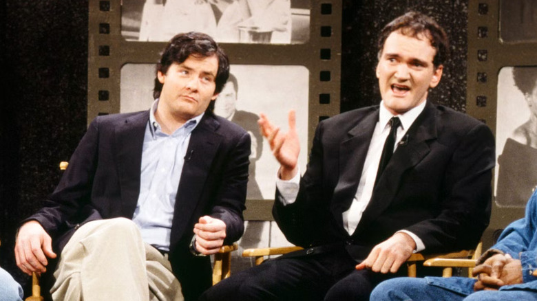 David Koechner sitting next to Quentin Tarantino on SNL