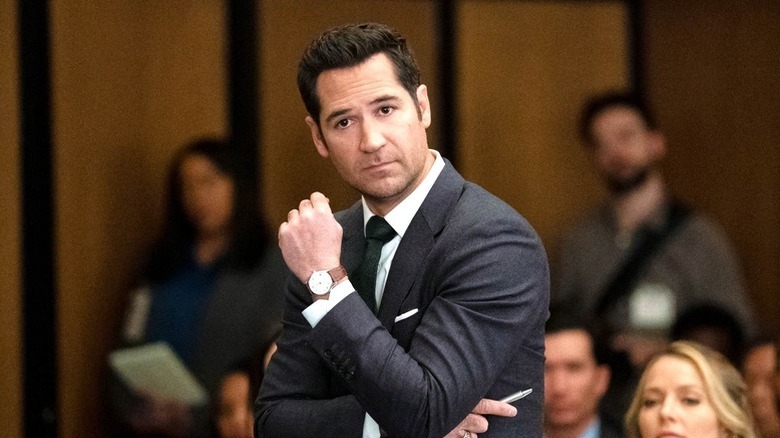 Mickey Haller (Manuel Garcia-Rulfo) stands unimpressed in a courtroom on The Lincoln Lawyer