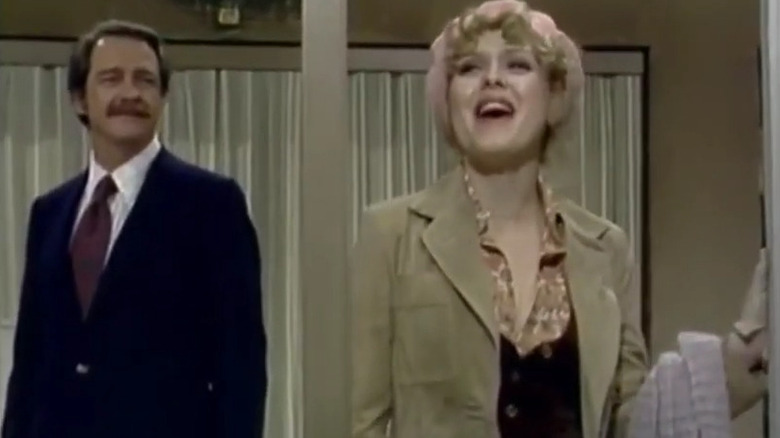 Charlotte (Bernadette Peters) looking ecstatic next to a smiling Richard (Richard Crenna) on All's Fair