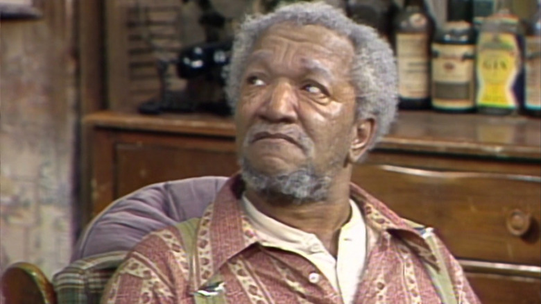 Fred Sanford (Redd Foxx) looking up on Sanford and Son