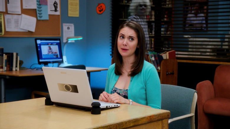 Beetlejuice appearing behind Annie (Alison Brie) on Community