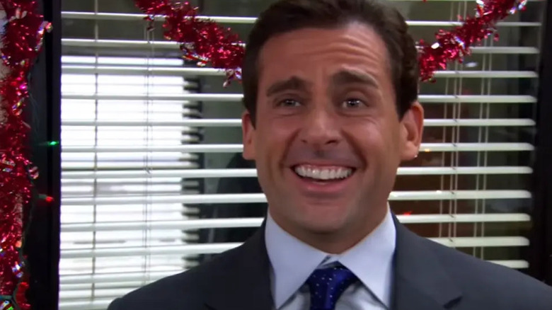 Michael Scott (Steve Carell) laughing on The Office