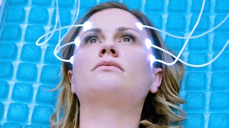 Anna Paquin with cables attached to her head on Electric Dreams