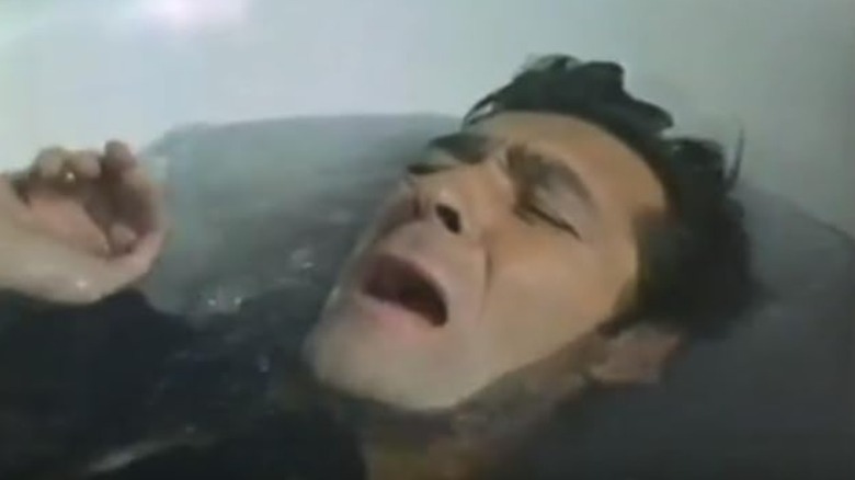 Maurice Kaufmann looking anguished in a bathtub on Journey into the Unknown
