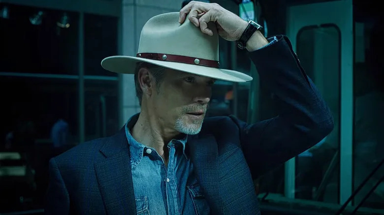 Raylan Givens (Timothy Olyphant) puts on his Stetson on Justified: City Primeval