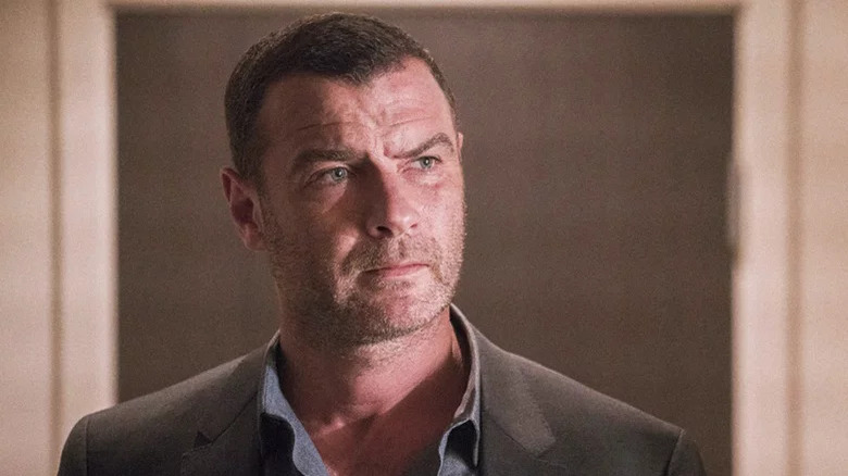 Ray Donovan (Liev Schreiber) stands grimly on Ray Donovan