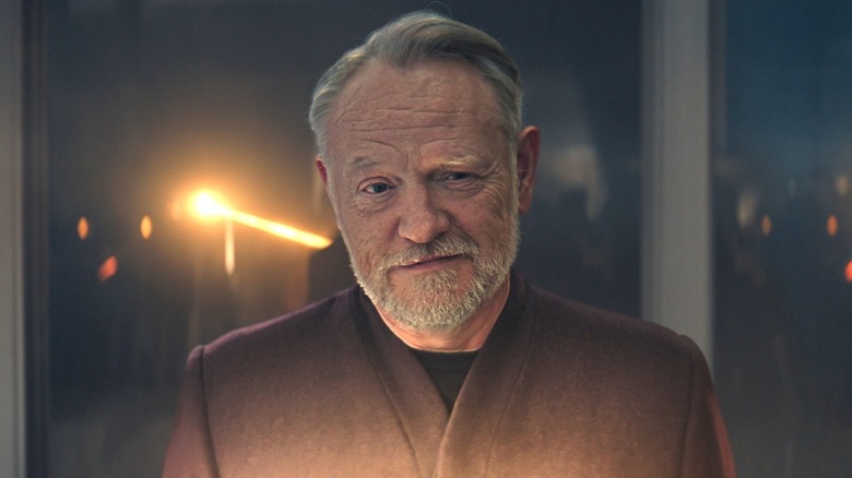 Hari Seldon (Jared Harris) smiles wryly in Foundation