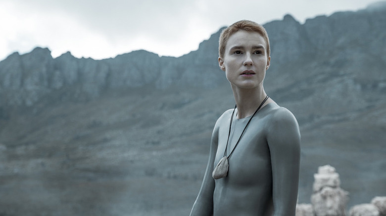 Mother (Amanda Collin) surveys a rocky landscape in Raised by Wolves