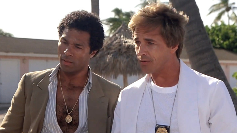 Philip Michael Thomas' Rico Tubbs and Don Johnson's Sonny Crockett standing together in Miami Vice