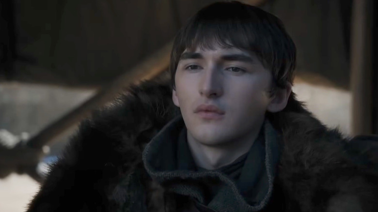 Isaac Hempstead Wright as Bran Stark sits in a tent in Game of Thrones