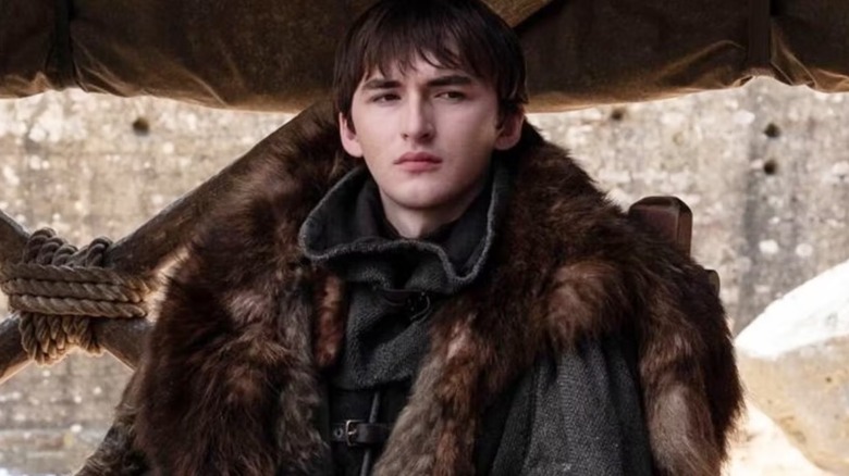 Bran Stark (Isaac Hempstead Wright) in a tent sat on a chair in Game of Thrones