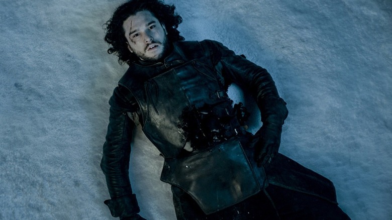 Jon Snow (Kit Harington) dead in the snow on Game of Thrones