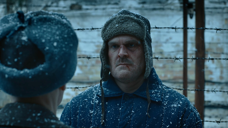 Hopper (David Harbour) in the snow on Stranger Things season 4