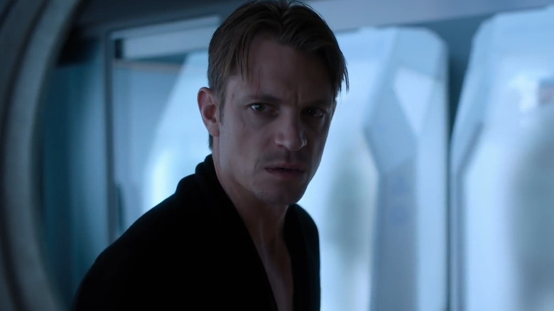 Takeshi Kovacs (Joel Kinnaman) stares down intently in Altered Carbon