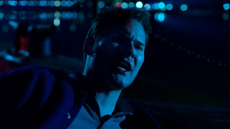 Bryce (Justin Prentice) shouting from a dock on 13 Reasons Why