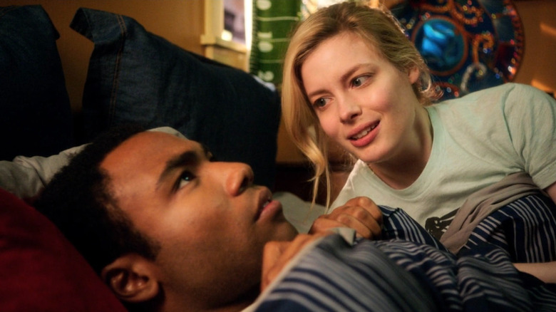 Britta (Gillian Jacobs) talking to Troy (Donald Glover) in bed on Community