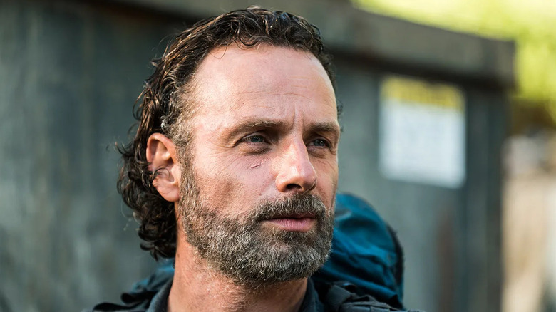 Andrew Lincoln as Rick Grimes smiles on The Walking Dead