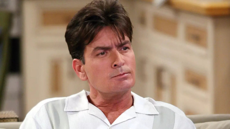 Charlie Sheen as Charlie Harper frowns on Two and a Half Men
