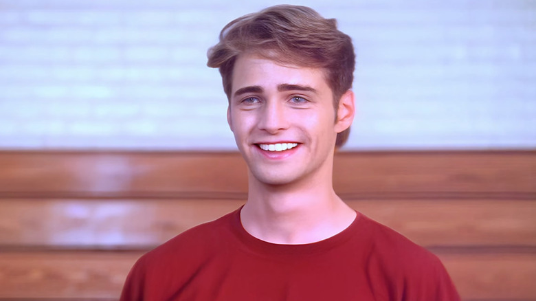 Jason Priestley as Brandon Walsh smiles on Beverly Hills 90210